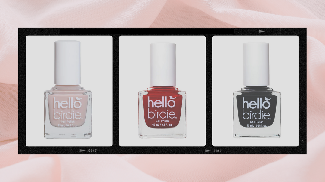 A film strip with three photos of nude, red, and black Hello Birdie classic nail polishes, laid over a swath of gauzy pink fabric