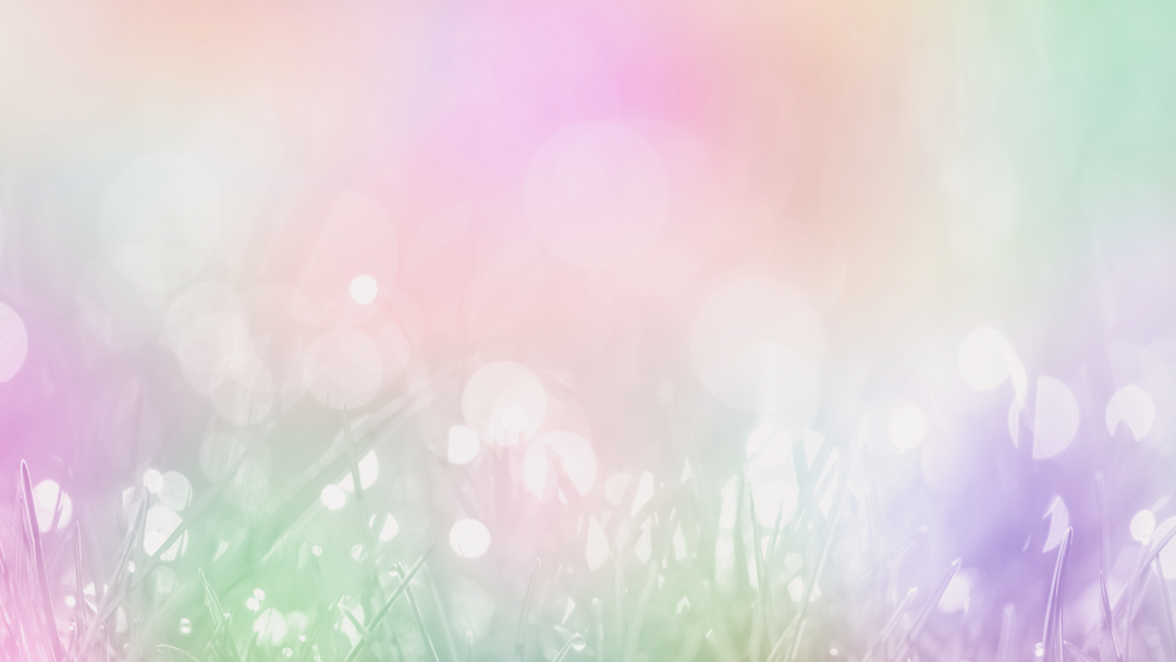 A dreamy, pastel color blend filter over a patch of glistening grass