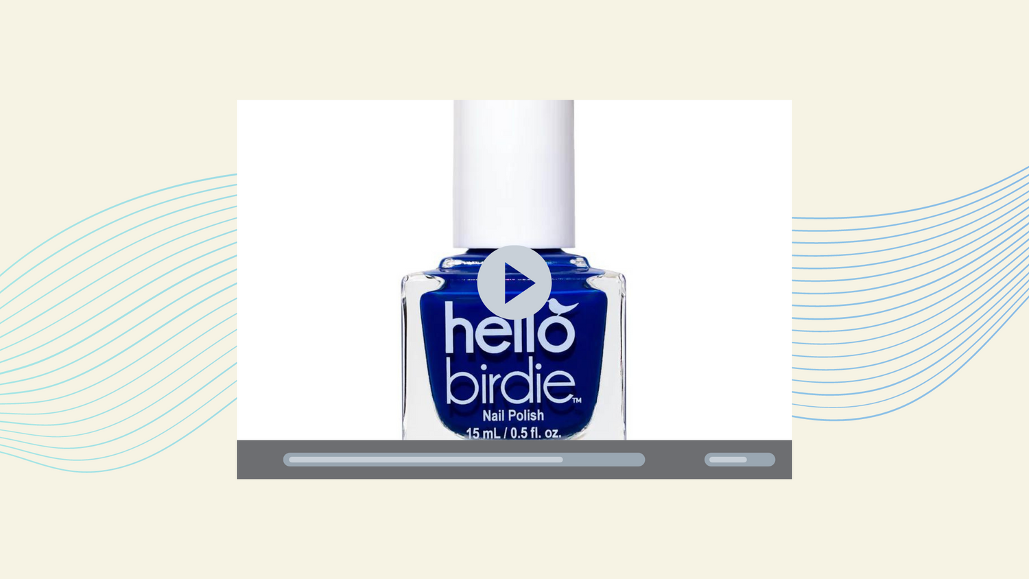 Hello Birdie blue polish on a YouTube-like media screen, atop a cream and blue swirled background