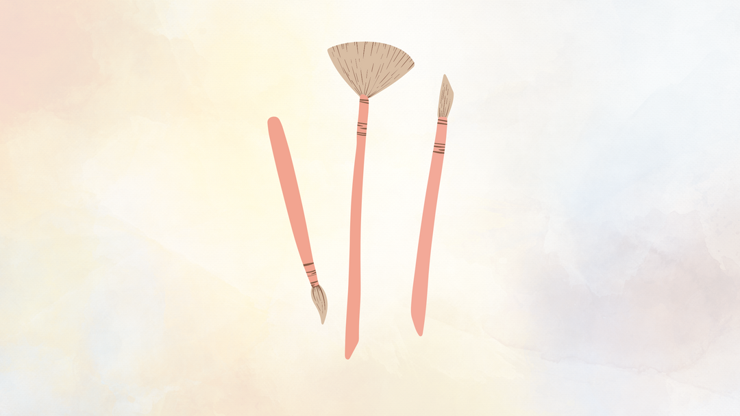 Illustrations of three art brushes with coral pink handles and tan bristles, on a pale watercolored background