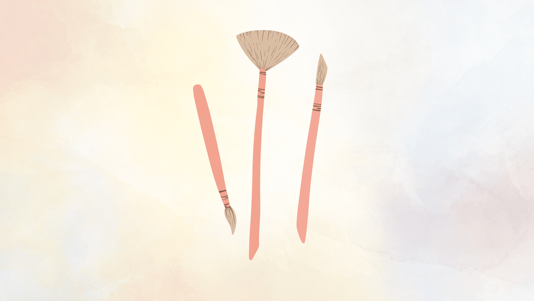 Illustrations of three art brushes with coral pink handles and tan bristles, on a pale watercolored background